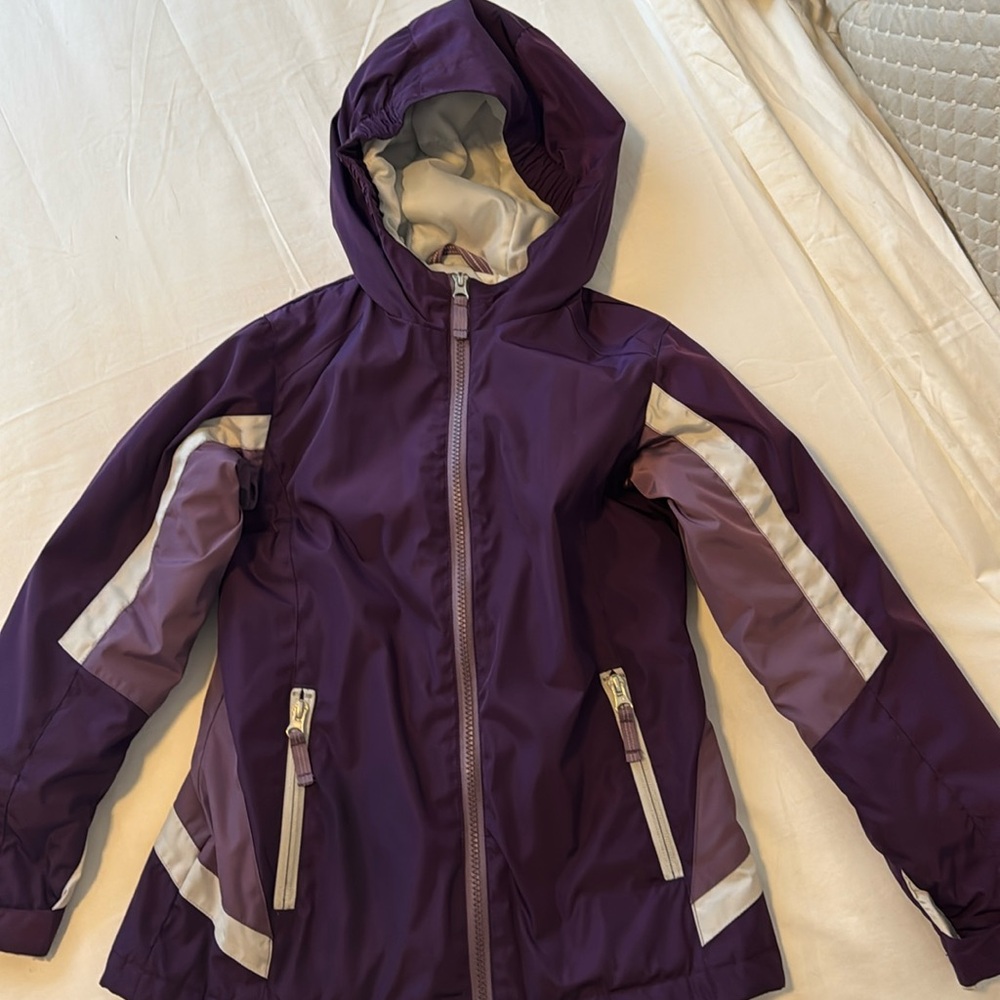 Land’s End girls size 7–8 winter jacket. Zippered pockets, purple. Like new.